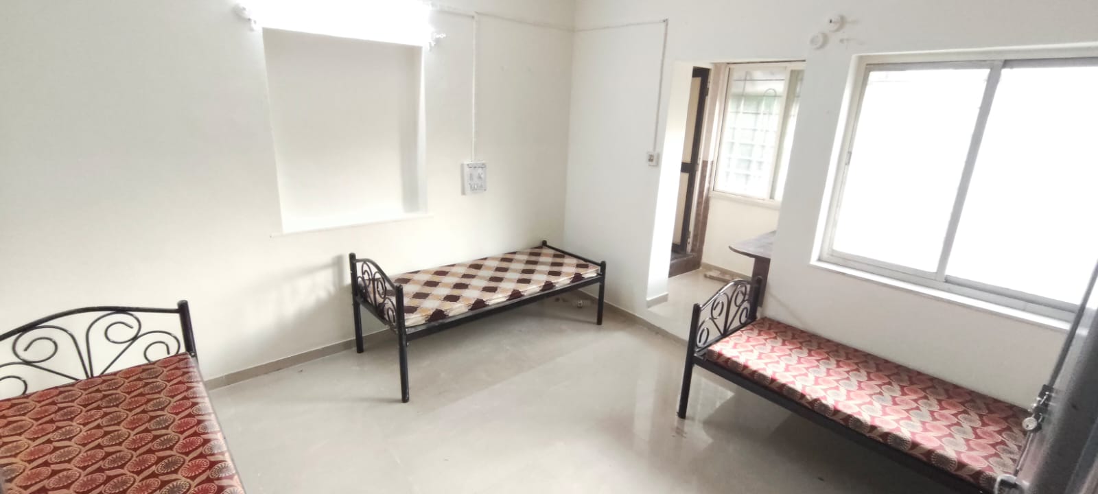 Triple sharing room at Vidya Girls PG